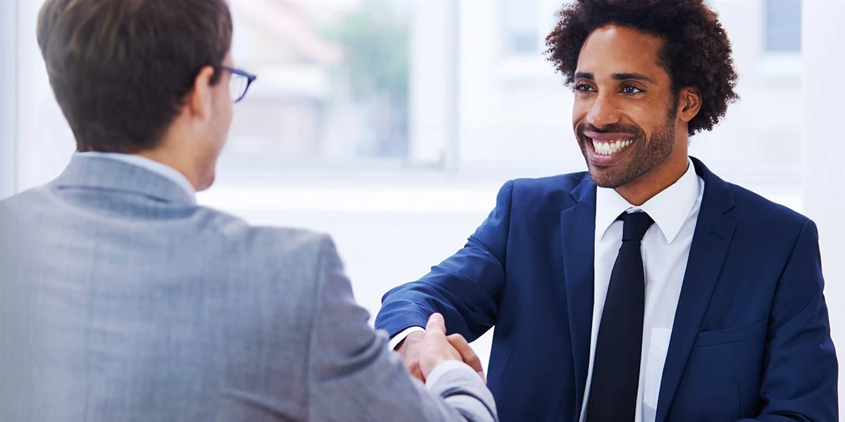 two people shaking hands
