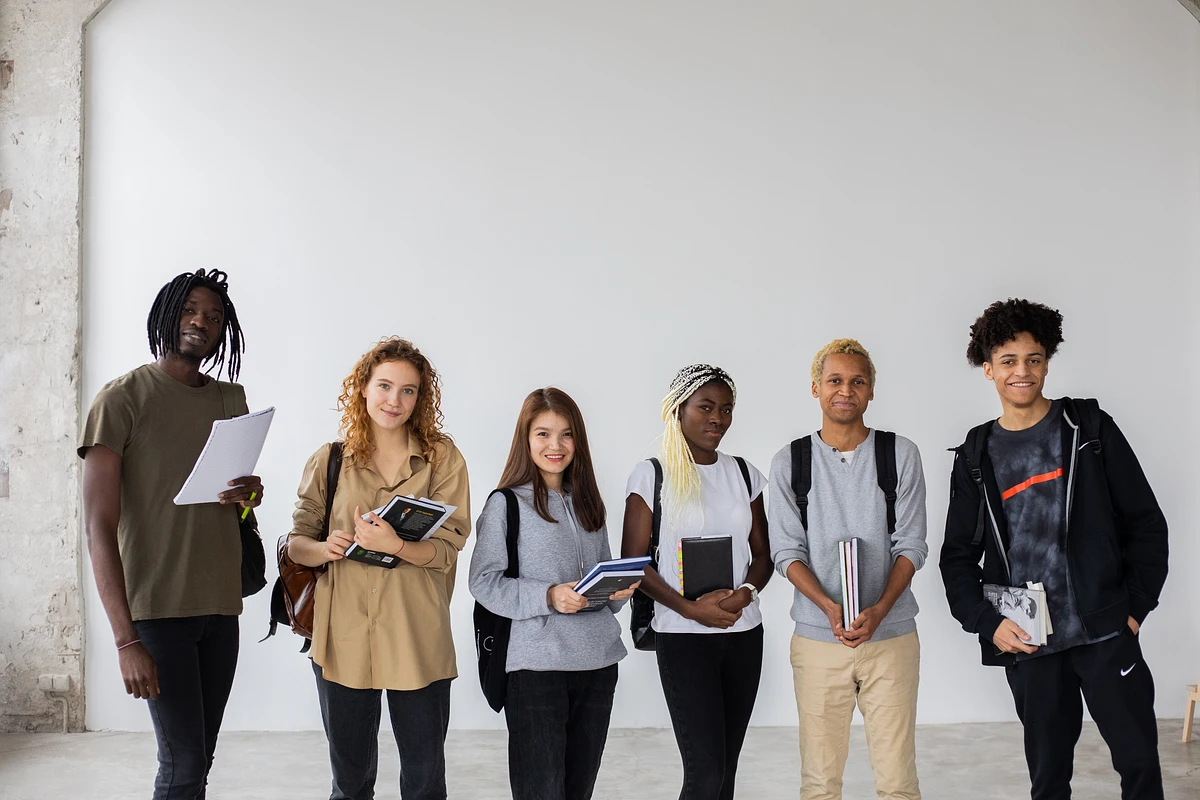 Six students standing together